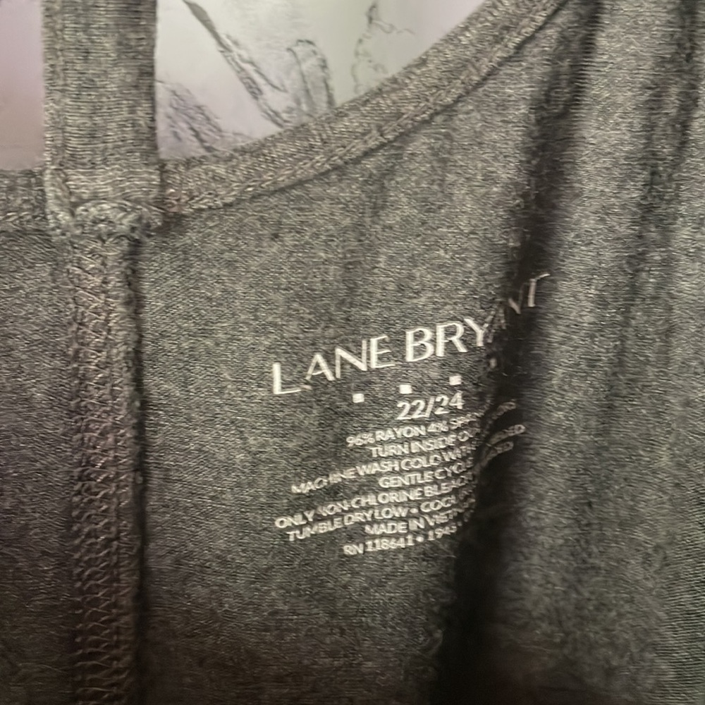 Lane Bryant size 22/24 gray tunic with flower on from and caging in the back. - Picture 2 of 7